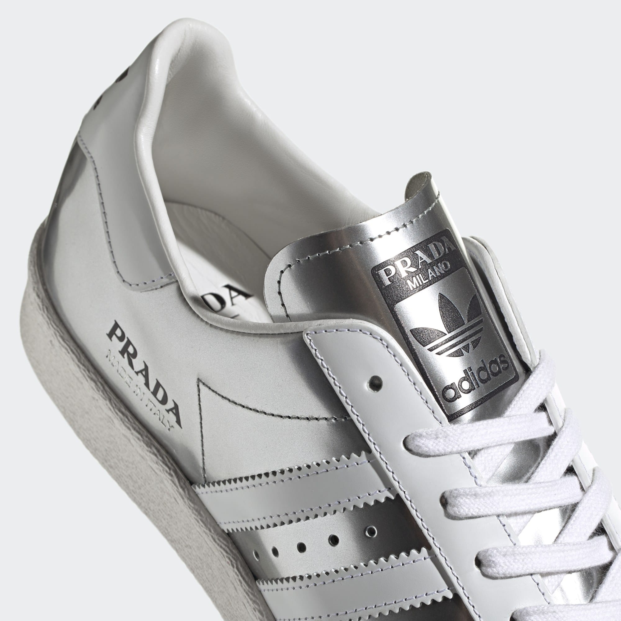 adidas gazelle silver green womens Adidas x Prada Men's 450 Metallic Leather Silver low top sneakers