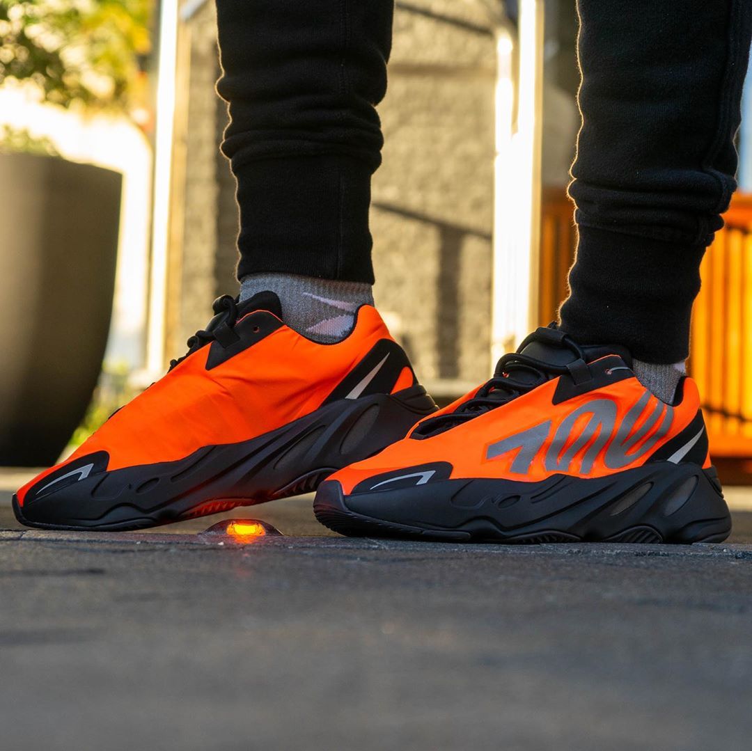 Black and orange yeezy 700 on sale