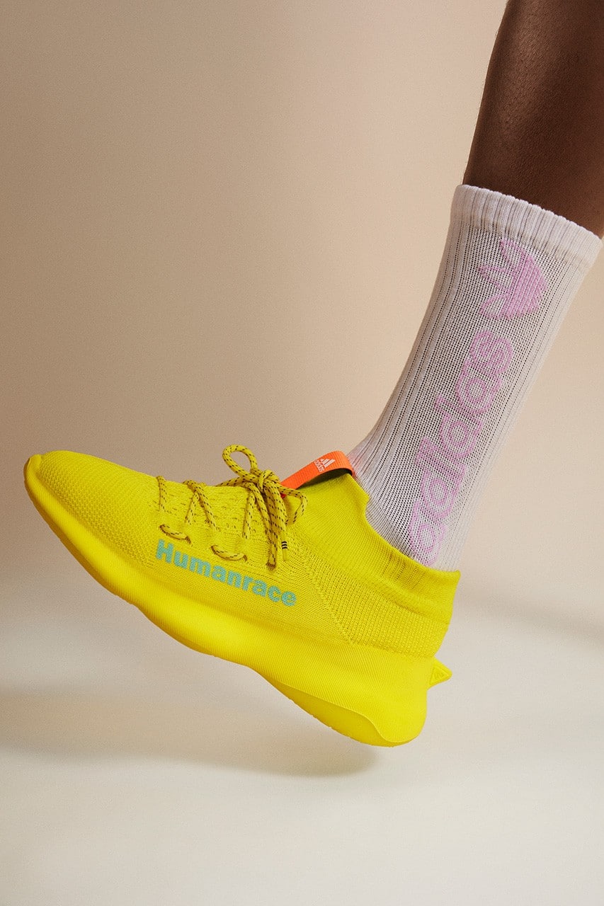 Adidas human race yellow on feet sale