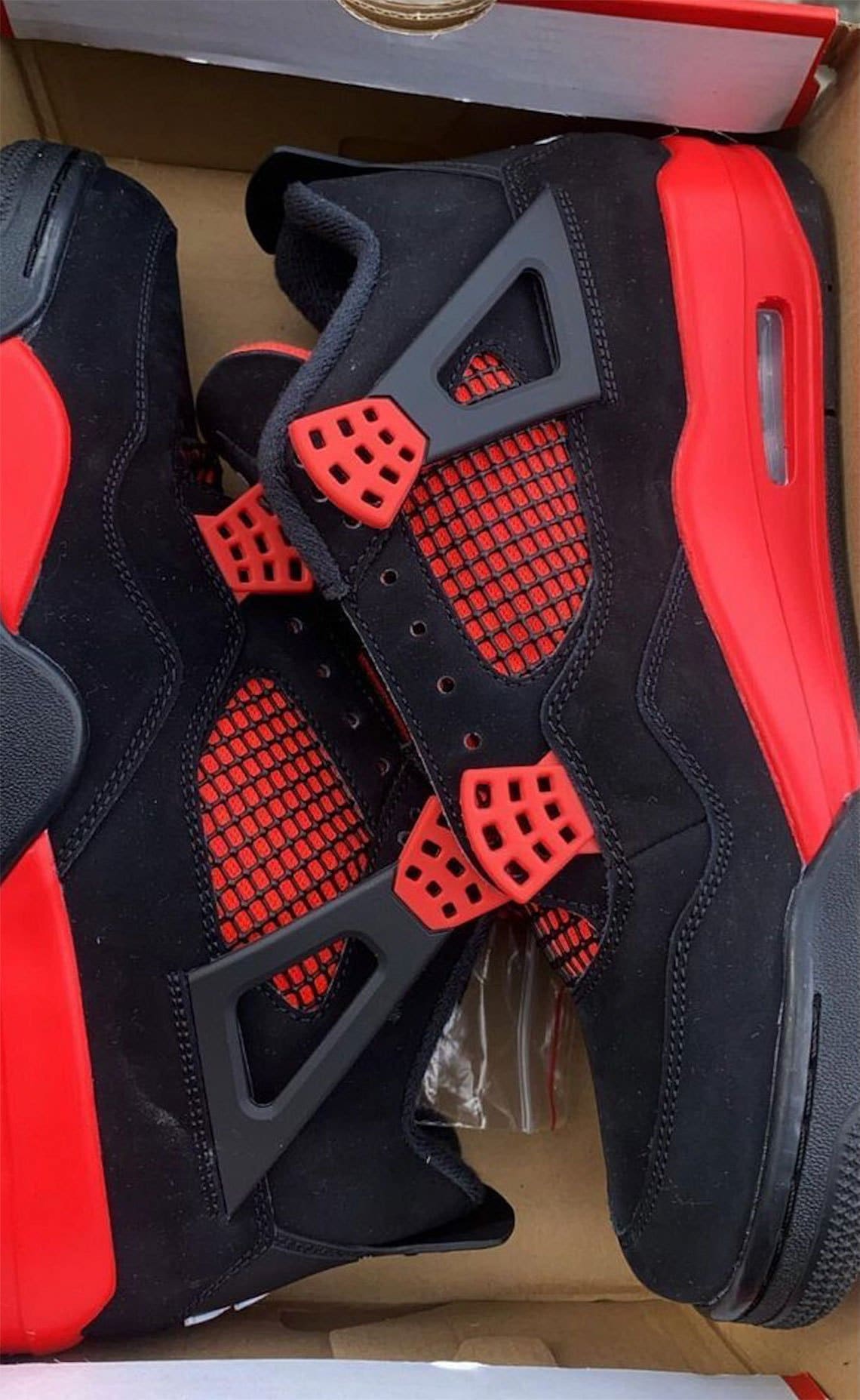 On-Feet Images of The Air Jordan 4 Red Thunder •