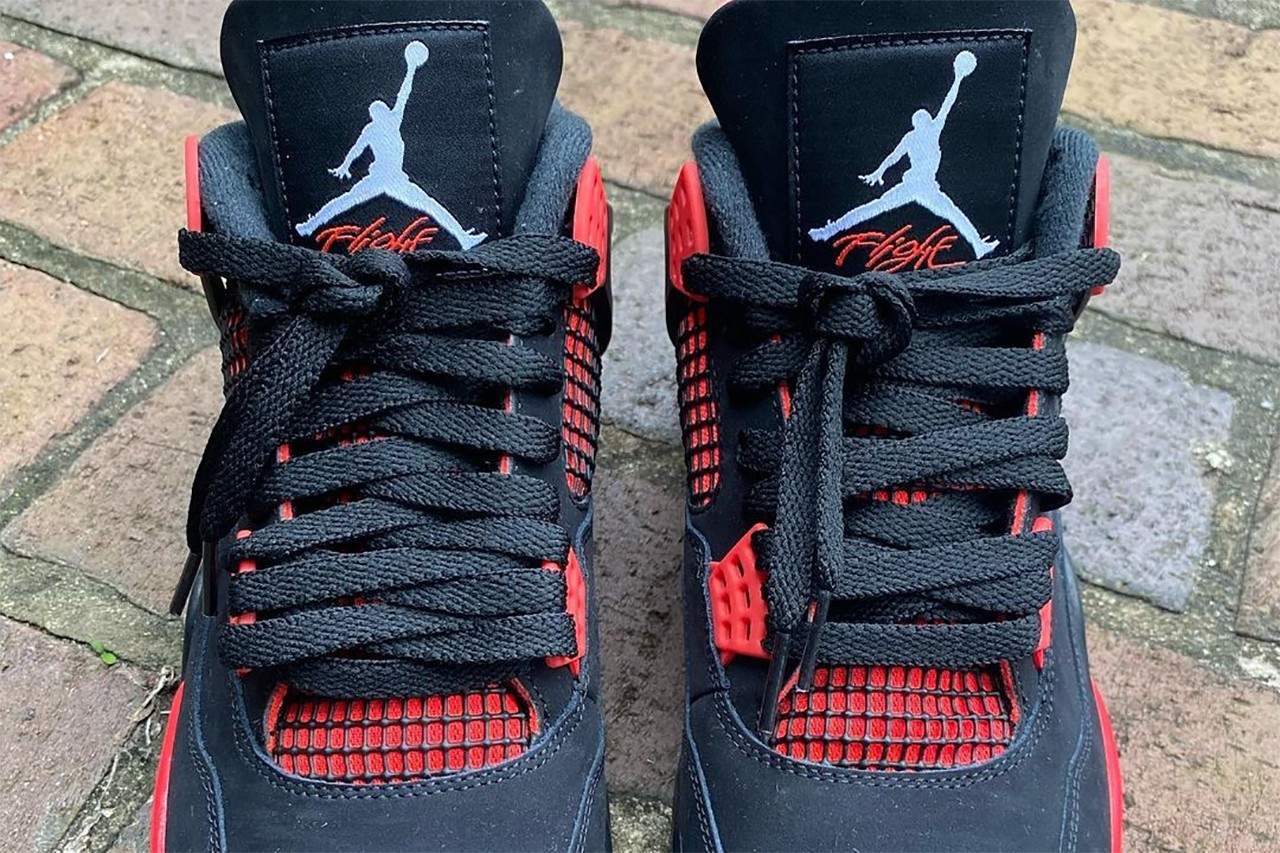 On-Feet Images of The Air Jordan 4 Red Thunder •