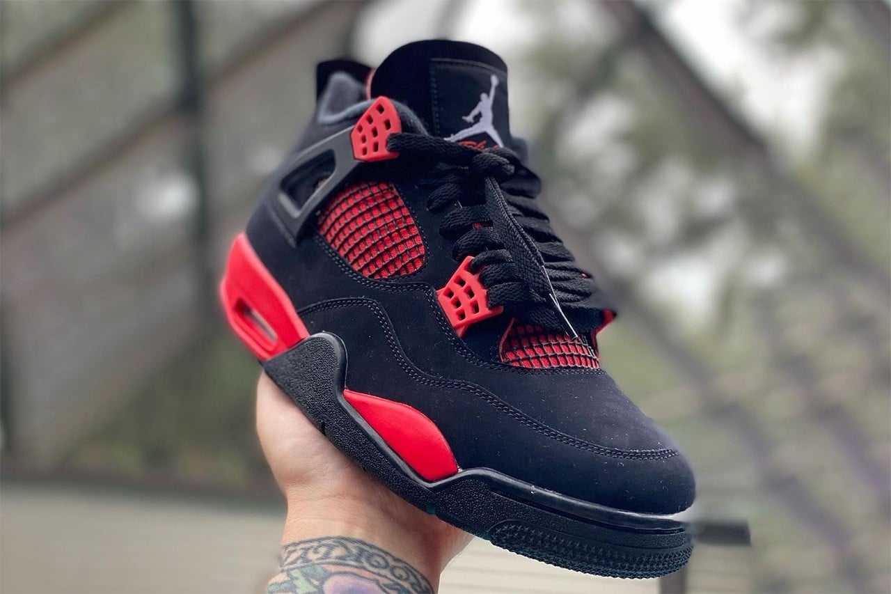 On-Feet Images of The Air Jordan 4 Red Thunder •