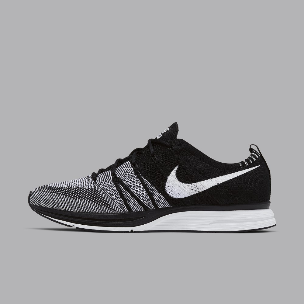 Flyknit trainer black and white sale