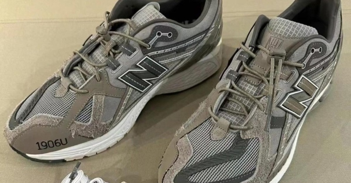 Three-Way Collaboration with INVINCIBLE, N.HOOLYWOOD and New Balance for a Grey 1906U Three-Way Collaboration with INVINCIBLE, N.HOOLYWOOD and New Balance for a Grey 1906U