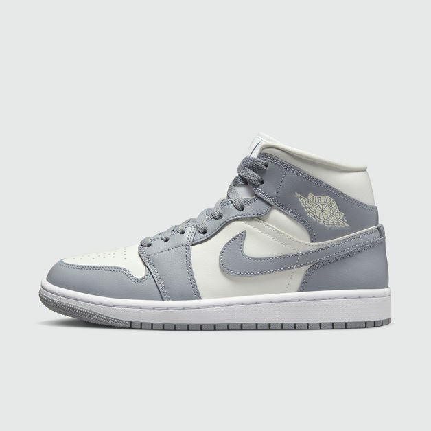 Graue Hits decken den neusten Air Jordan 1 Mid WMNS