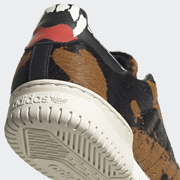 Beware, Risk of Biting! adidas Powerphase in Rottweiler Design