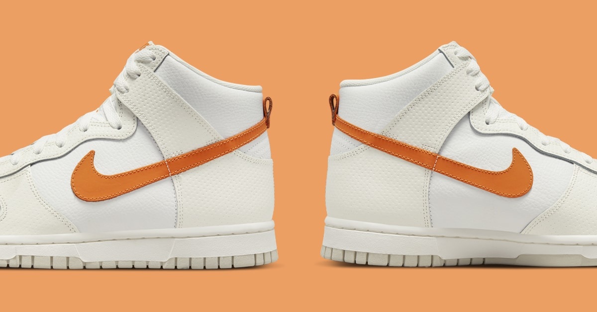 Kommender Nike Dunk High ist mit „Orange Swooshes“ und perforierten Overlays ausgestattet