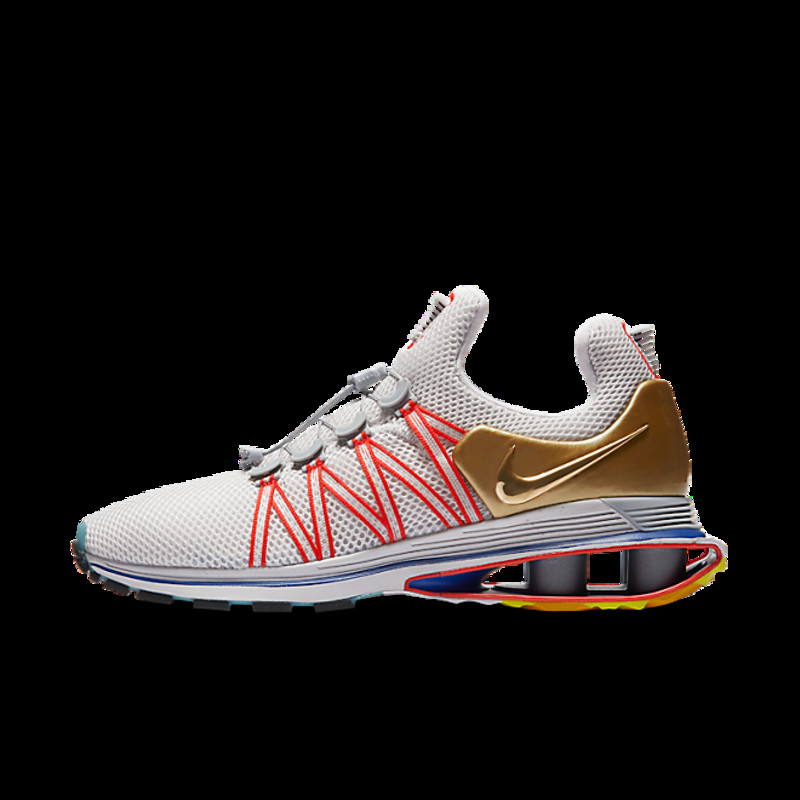 Nike shox gravity elemental on sale gold