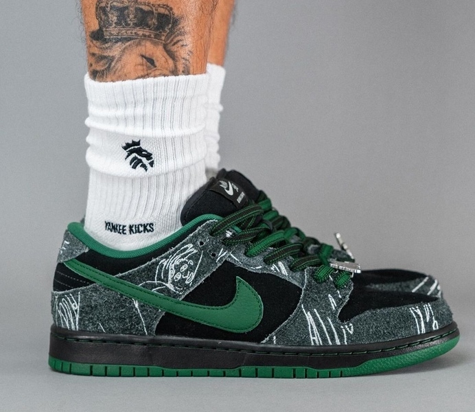 There Skateboards Nike SB Dunk Low On Feet 2