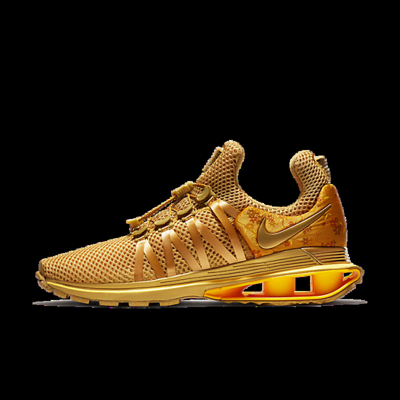 Nike shox gravity outlet dourado